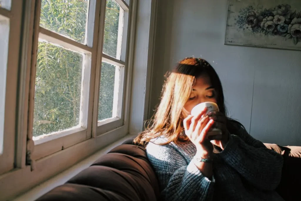 A calm ordinary morning with daylight and coffee, a realistic morning routine